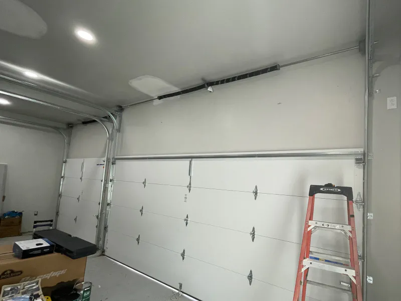 front view of a high lift garage door after installation houston tx
